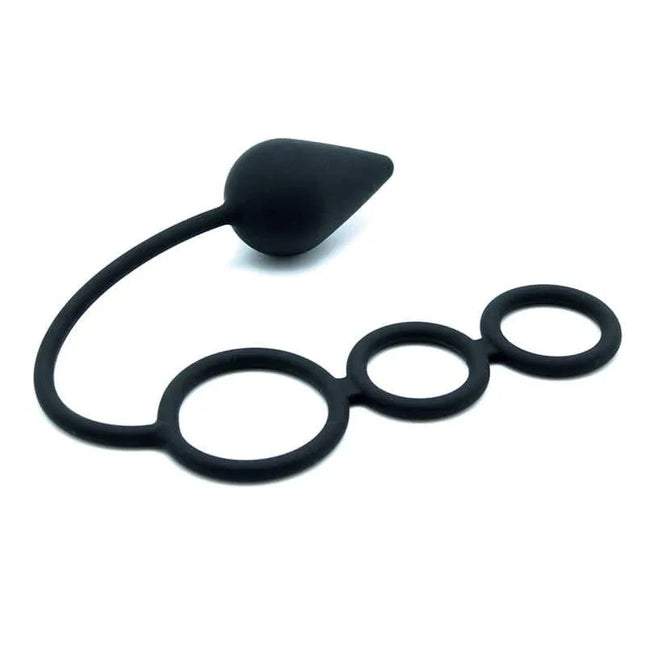 Anal Plug with Penis Rings Silicone in black, featuring three-ring system for enhanced sensational experience, made of body-safe silicone.