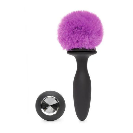 Purple fluffy anal plug and jeweled butt plug set displayed on white background