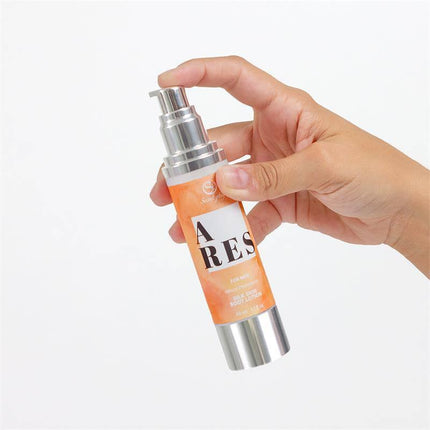  Person holding Ares Silk Skin Body Lotion 50ml pump bottle