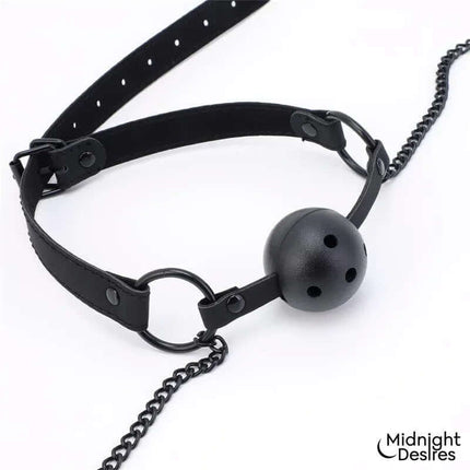 Ball Gag with Nipple Clamps made of vegan leather, featuring breathable design and adjustable clamps for a secure fit.
