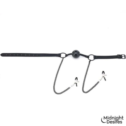 Ball Gag with Nipple Clamps from Midnight Desires in vegan leather, featuring adjustable components for comfort and control.