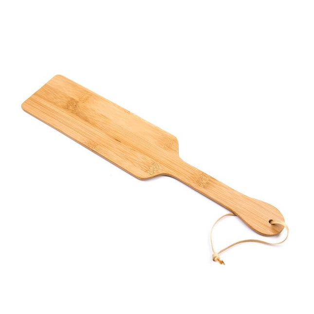 bamboo bdsm paddle 35.7 cm light wooden spanking paddle with wrist cord on white background