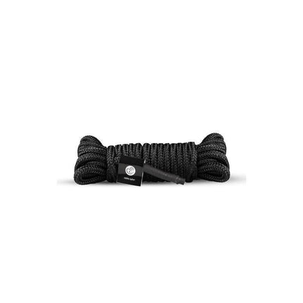 Black bondage rope part of BDSM Box for intimate moments.