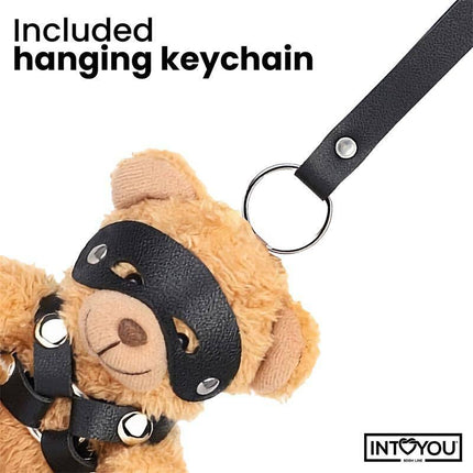Bearly Keychain BDSM Teddy Bear with Chest Harness, featuring detachable accessories like blindfold and vegan leather harness.