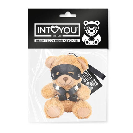 Bearly Keychain BDSM Teddy Bear with Chest Harness and detachable blindfold, showcased in packaging.