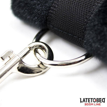 Close-up of Bed Restraint Set with Adjustbable and Desmontable Cuffs showing detachable cuff and metal ring.