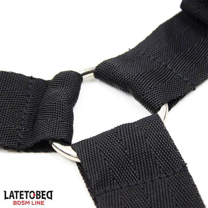 Close-up of Bed Restraint Set with Adjustbable and Desmontable Cuffs from Latetobed showing secure black straps and metal rings.