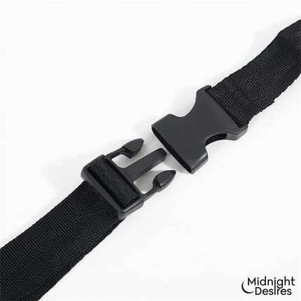 Close-up of black buckle on Bed Restraint Set by Midnight Desires, highlighting vegan leather straps for secure, playful control.