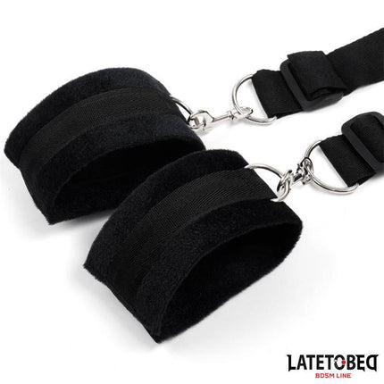 Latetobed Bed Restraints set featuring black wrist cuffs with adjustable straps for BDSM play.
