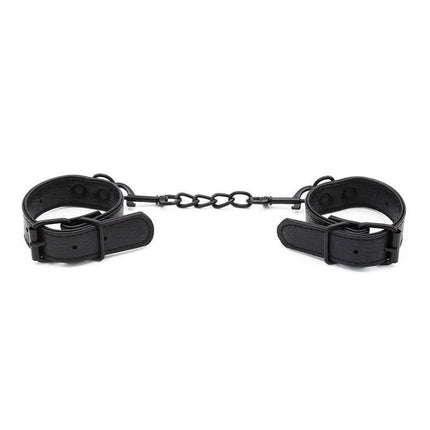 Black leather Beginner Adjustable handcuffs with detachable chain for secure and comfortable restraint.