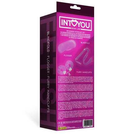 Packaging of Beginners Bondage Set3 Pieces Purple by Intoyou, featuring a mask, flogger, and furry handcuffs.