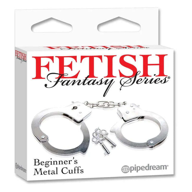 Packaging for Beginners Metal Handcuffs, showcasing metal cuffs and keys, part of the Fetish Fantasy Series by Pipedream.