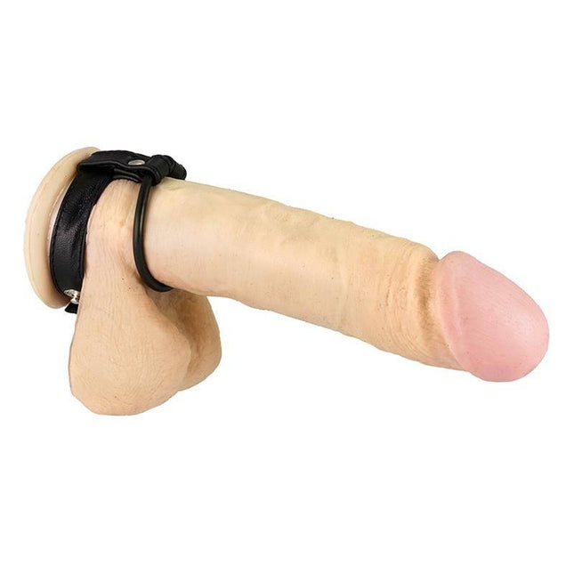 Bondage Play Penis and Ball Strap in black rubber provides enhanced sensation and support for couples exploring bondage play.