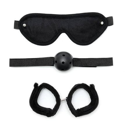 Bondage Set 3 Pieces Black featuring eyemask, cuffs, and ball gag for adventurous couples play.
