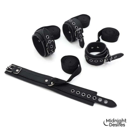 Bondage Set with Blindfold, Feather Tickle and Cuffs, featuring soft vegan leather and silver hardware for comfort and versatility.