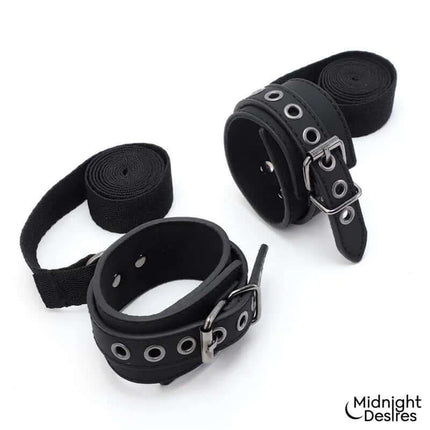 Bondage Set with Blindfold, Feather Tickle and Cuffs featuring vegan leather cuffs and straps from Midnight Desires.