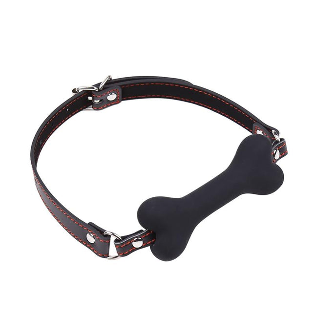 Alt Tag: black silicone bone gag ball with adjustable black leather strap and red stitching on white background