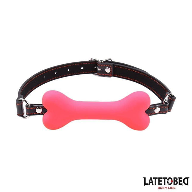 Bone Gag Pink Adjustable with bone-shaped design, stylish accessory with adjustable strap for personalized fit.
