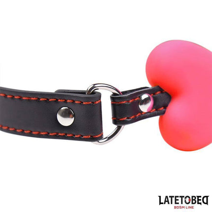 Bone Gag Pink Adjustable with black strap and stitching, featuring a bone-shaped design and secure metal hardware for comfort and style.