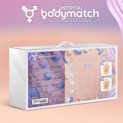 Booskin Realistic Breast Form D Cup Liquid Silicone packaging by Bodymatch with silicone clothing design.