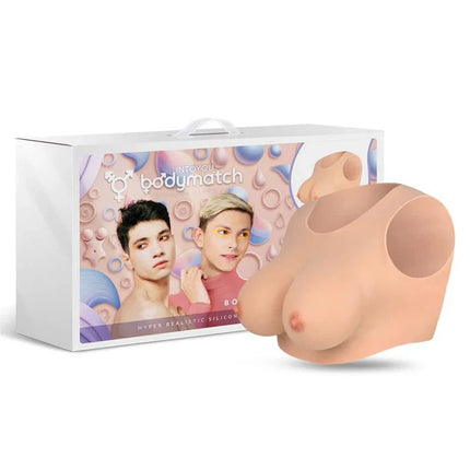Bowie Realistic Breast Form D Cup Liquid Silicone by Bodymatch in front of product packaging, offering hyper-realistic detail.