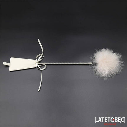 Bowknot Feather Tickler Paddle with white bowknot design and feather tickler for playful intimacy, 46 cm long, 39 g weight.