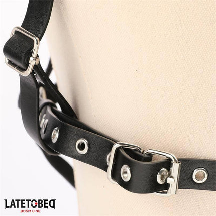 Close-up of the adjustable leather Breast harness Adjustable from Latetobed BDSM line with metal buckles and straps.
