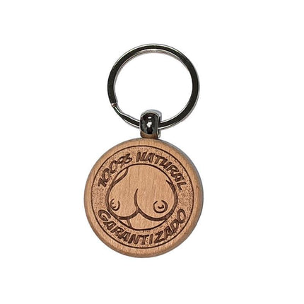 Breast Shaped Wooden Keychain made of olive wood, perfect for cheeky gifts, detailed and durable design for playful events.