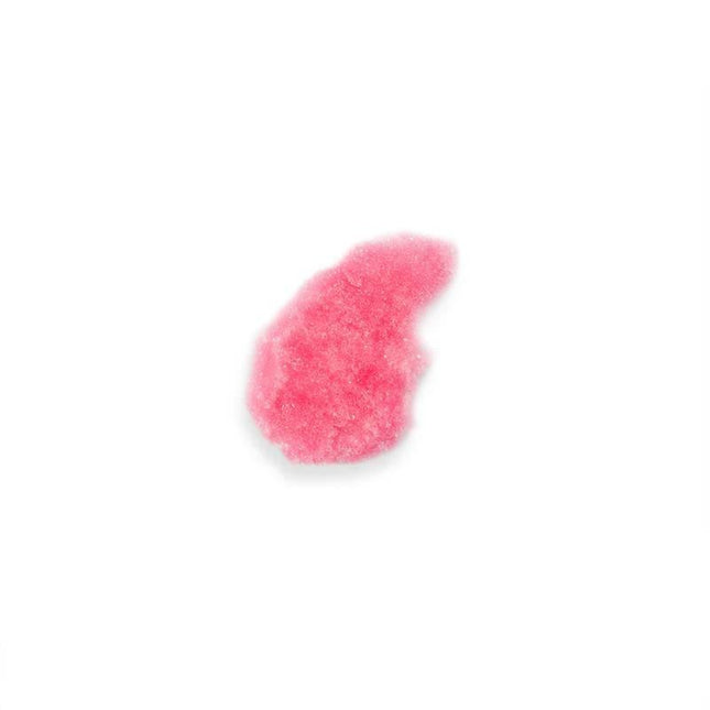 Close-up of pink Bubbling Bath Salts from Pretty but Wild collection, showcasing exfoliating texture on white background.