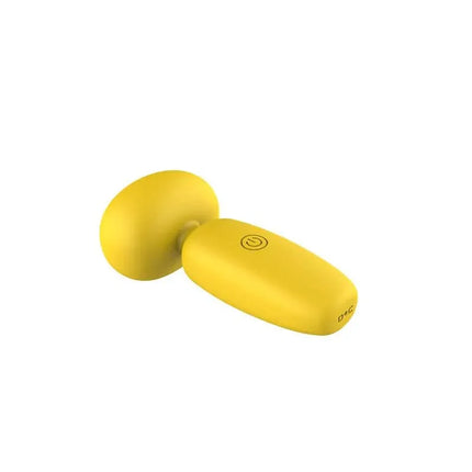 Buster Mini Massager with USB Charging in yellow, showcasing sleek design and palm-sized convenience.