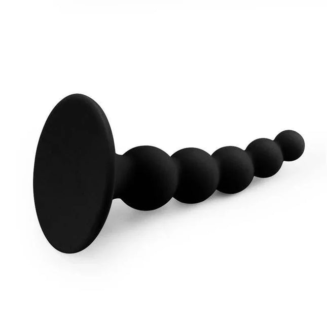 Butt Plug Lure Me Silicone Black with suction cup, beaded design for anal stimulation, suitable for beginners and curious adults.