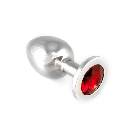 Stainless steel butt plug with red glass top, metal-9,7 cm long, for BDSM and intimate moments. Elegant design and durable material.