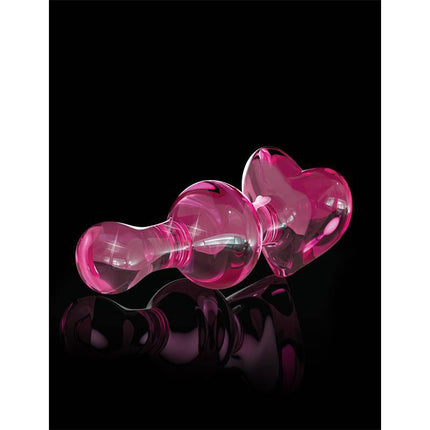 Butt Plug No. 75 elegant pink glass massager with heart-shaped design on a black background