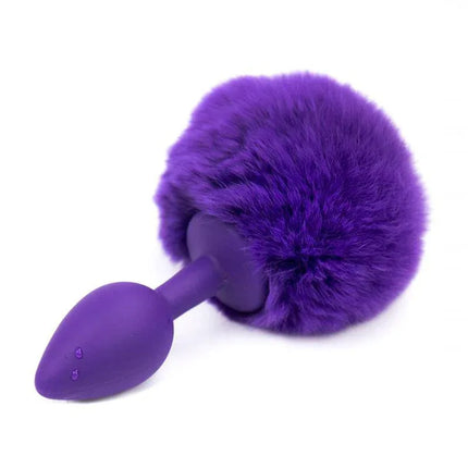 Butt Plug with Pompon Purple Size S, compact anal toy with fluffy pompom, ideal for beginners, 7 cm long by 3 cm wide.