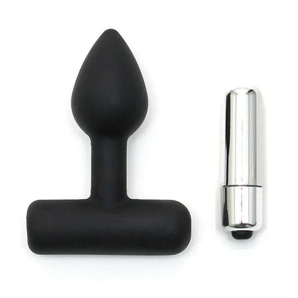 Butt Plug with Vibrating Bullet Black silicone toy next to a silver bullet for enhanced stimulation.