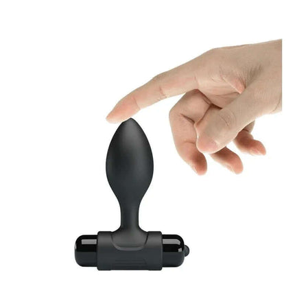 Hand touching Waterproof Butt Plug With Vibration Silicone with built-in bullet for targeted stimulation.
