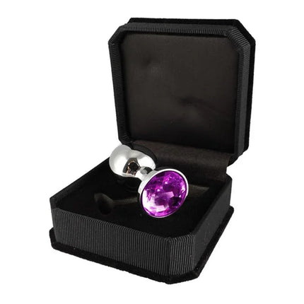 Butt Plug XS with cristal 5.7 cm in elegant black box, featuring a steel body and purple gem for discreet luxury and comfort.