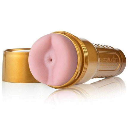 Fleshlight Pink Butt STU, Butt Stamina Training Masturbator Anus with gold case, for intense solo experience.