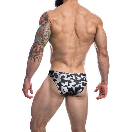 Model wearing C4M01 Low Rise Bikini Brief Camo, showcasing the camouflage design and fit for modern men's comfort and style.