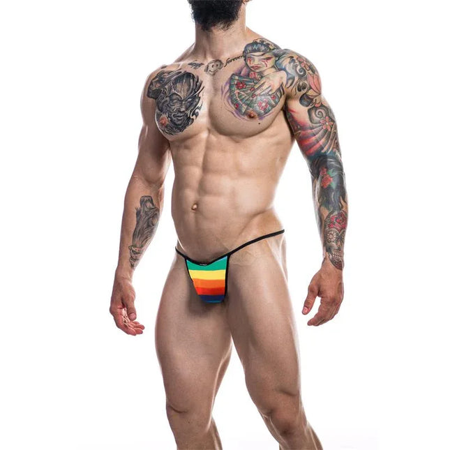 Model wearing C4M12 Briefkini Rainbow with vibrant design for bold style and comfort by CUT4MEN, showcasing modern men's fashion.