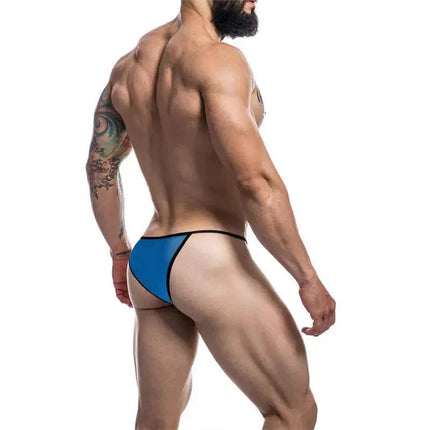 Man wearing C4M12 Briefkini Royal BlueOTS by CUT4MEN showing back view in royal blue color.