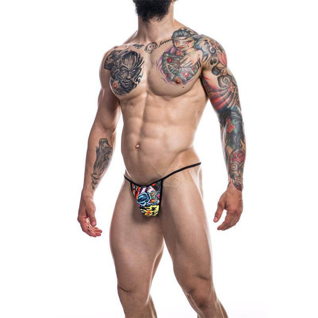Model wearing C4M12 Briefkini Tattoo by CUT4MEN showcasing bold tattoo-inspired design with a sleek and modern silhouette.