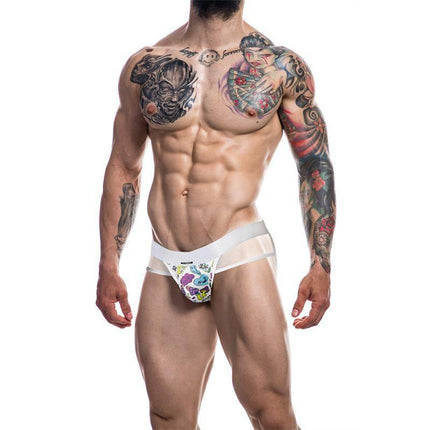 Model wearing C4M13 Mixed Jockstrap Miami Ink by CUT4MEN, featuring tattoo designs and transparent panels for modern style and comfort.