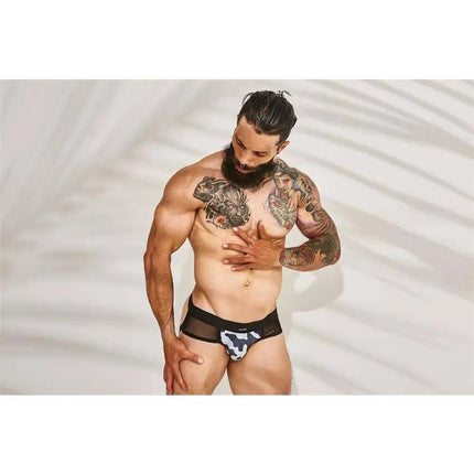Model wearing C4M13 Mixed Jockstrap Shadow Camo with transparent accents, highlighting comfort and style.