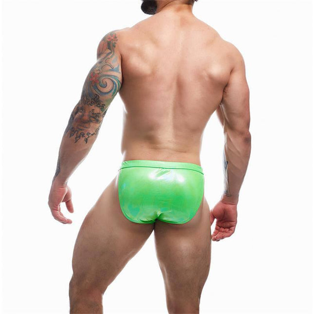 Man wearing C4M32 Brief / Swimwear Emerald Green showcasing back view, combines comfort and style, perfect for modern men's swimwear needs.