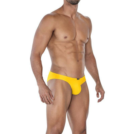 Model wearing C4MSPX01 Micro Brief Bright Yellow, showcasing sleek fit and vibrant color from CUT4MEN collection for versatile wear.