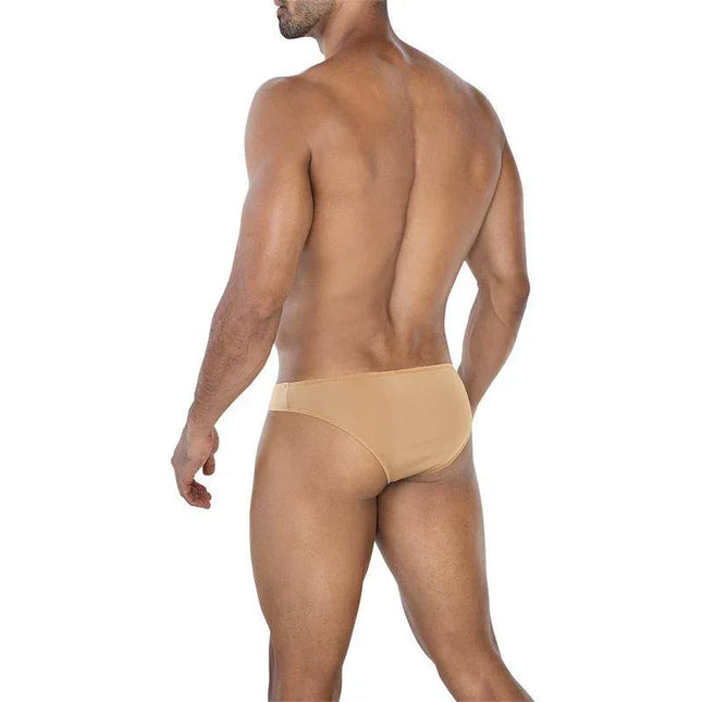 Male model wearing C4MSPX01 Micro Brief Golden Sand from CUT4MEN collection, showcasing vibrant color and comfortable fabric.