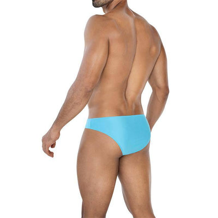 C4MSPX01 Micro Brief Turquoise on model showcasing vibrant turquoise color and fit, perfect for active wear and beach days.