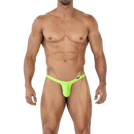 C4MSPX11 Micro Thong Fluo in vibrant green on male model, showcasing T-back design and ergonomic pouch for enhanced support and comfort.
