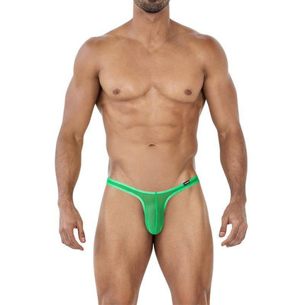 C4MSPX11 Micro Thong Green on male model showcasing minimalist T-back design.